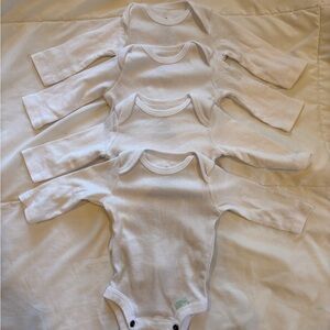 Set of Four White Long Sleeved Onesies Newborn